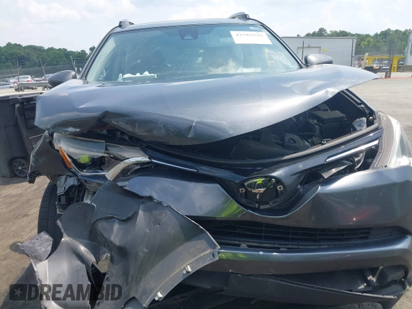 2018 Toyota RAV4 XLE with VIN JTMWFREV7JD111785, listed as a IAAI auction lot 42583535 with 110,724 mi miles and . Bid and sale history available at DreamBid. Image 6.