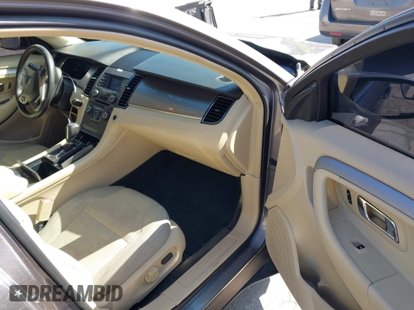 2013 Ford Taurus SEL z VIN 1FAHP2H83DG231000, wystawiony jako IAAI lot #41986420 z przebiegiem 200 390 mil mil oraz . Historia ofert i sprzedaży dostępna na DreamBid. Obrazek 5.