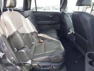 2017 Honda Pilot EX-L with VIN 5FNYF5H53HB029780, listed as a IAAI auction lot 41667838 with 104,803 mi miles. Bid and sale history available at carsss.com. Image 8.