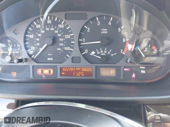 2003 BMW 3 Series 325i with VIN WBAAZ33443PH32847, listed as a IAAI auction lot 41754298 with 165,494 mi miles. Bid and sale history available at carsss.com. Image 7.