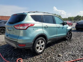 2013 Ford Escape SE with VIN 1FMCU0G99DUD03147, listed as a Copart auction lot 60152775 with 156,551 mi miles and Salvage title. Bid and sale history available at DreamBid. Image 3.