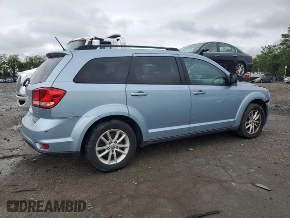 2013 Dodge Journey SXT with VIN 3C4PDCBG0DT619382, listed as a Copart auction lot 56565205 with 176,112 mi miles and Salvage title. Bid and sale history available at DreamBid. Image 3.