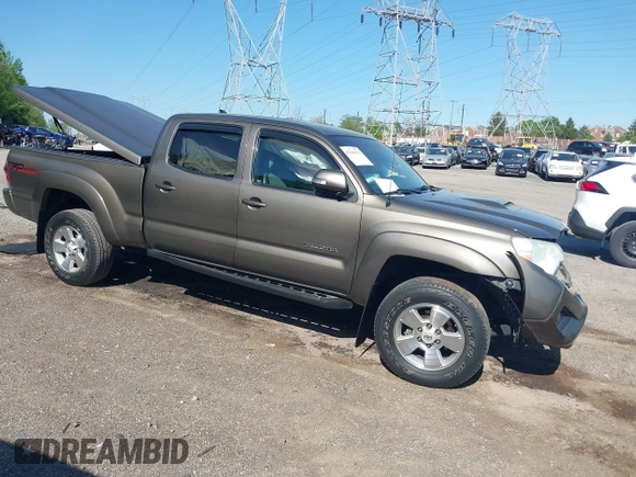 2015 Toyota Tacoma with VIN 3TMMU4FN5FM082376, listed as a IAAI auction lot 42144113 with 98,244 mi miles and . Bid and sale history available at DreamBid. Image 1.