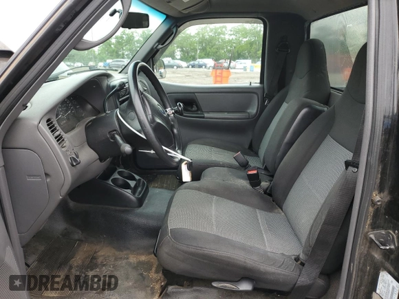 2003 Ford Ranger XL with VIN 1FTYR10DX3PB80133, listed as a Copart auction lot 58428325 with 150,617 mi miles and Salvage title. Bid and sale history available at DreamBid. Image 7.