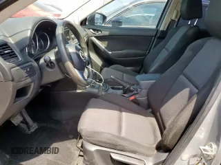 2013 Mazda CX-5 Sport with VIN JM3KE2BE5D0129797, listed as a Copart auction lot 58051185 with 200,712 mi miles and Salvage title. Bid and sale history available at DreamBid. Image 7.
