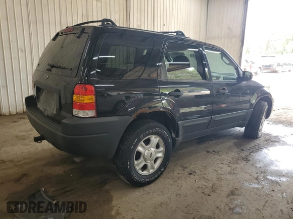 2003 Ford Escape XLT Popular 2 with VIN 1FMYU93193KB87078, listed as a Copart auction lot 59018205 with 222,082 mi miles and Salvage title. Bid and sale history available at DreamBid. Image 3.