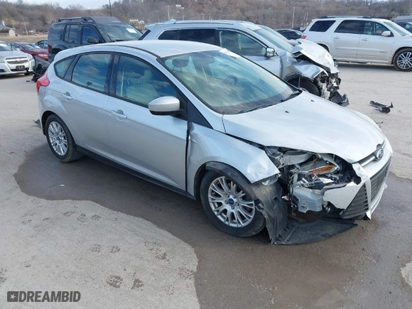 2012 Ford Focus SE with VIN 1FAHP3K27CL185977, listed as a IAAI auction lot 41674498 with 140,312 mi miles. Bid and sale history available at carsss.com. Image 1.