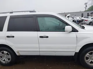 2005 Honda Pilot EX-L z VIN 5FNYF18595B052324, wystawiony jako IAAI lot #42366327 z przebiegiem 153 121 mil mil oraz . Historia ofert i sprzedaży dostępna na DreamBid. Obrazek 13.