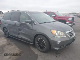 2008 Honda Odyssey Touring with VIN 5FNRL38888B018625, listed as a IAAI auction lot 41383235 with 215,255 mi miles. Bid and sale history available at carsss.com. Image 1.