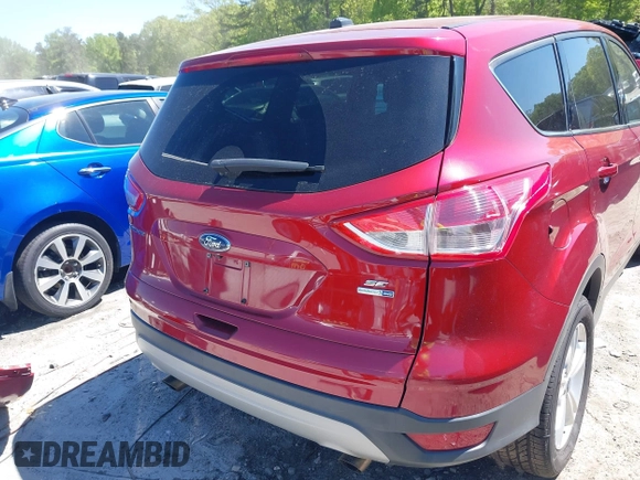 2016 Ford Escape SE with VIN 1FMCU9GX9GUC71209, listed as a IAAI auction lot 42037642 with 82,521 mi miles and . Bid and sale history available at DreamBid. Image 17.