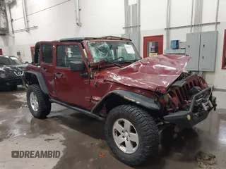 2007 Jeep Wrangler Unlimited Sahara z VIN 1J4GA59157L218278, wystawiony jako IAAI lot #41871773 z przebiegiem 145 992 mil mil oraz . Historia ofert i sprzedaży dostępna na DreamBid. Obrazek 1.