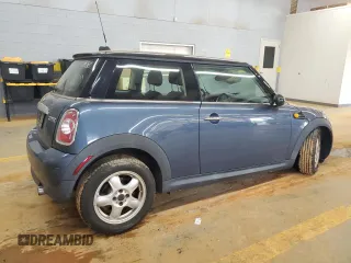 2011 MINI Hardtop with VIN WMWSU3C54BT184251, listed as a Copart auction lot 59298135 with 123,864 mi miles and Salvage title. Bid and sale history available at DreamBid. Image 3.