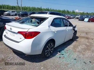 2017 Toyota Corolla L with VIN 5YFBURHE8HP689577, listed as a IAAI auction lot 42601267 with 142,853 mi miles and . Bid and sale history available at DreamBid. Image 4.