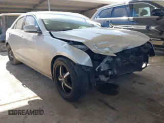 2014 Cadillac ATS Standard RWD with VIN 1G6AA5RX1E0174667, listed as a IAAI auction lot 41723540 with 171,804 mi miles. Bid and sale history available at carsss.com. Image 1.