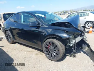 2023 Tesla Model Y Performance z VIN 7SAYGDEF0PF823996, wystawiony jako IAAI lot #42149152 z przebiegiem 42 229 mil mil oraz . Historia ofert i sprzedaży dostępna na DreamBid. Obrazek 1.