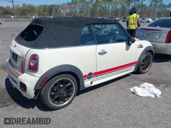 2010 MINI Convertible S with VIN WMWMS3C57ATY51245, listed as a IAAI auction lot 41802174 with 110,154 mi miles and . Bid and sale history available at DreamBid. Image 4.