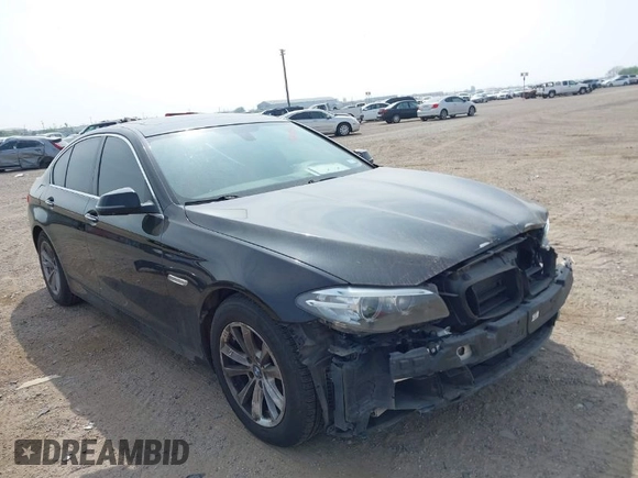 2015 BMW 5 Series 528i with VIN WBA5A5C58FD520694, listed as a IAAI auction lot 41804906 with 121,636 mi miles. Bid and sale history available at carsss.com. Image 1.