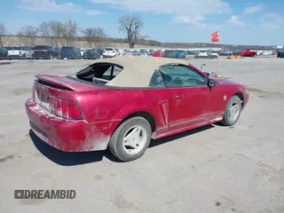 1999 Ford Mustang with VIN 1FAFP4445XF193138, listed as a IAAI auction lot 41716629 with 124,477 mi miles and . Bid and sale history available at DreamBid. Image 4.