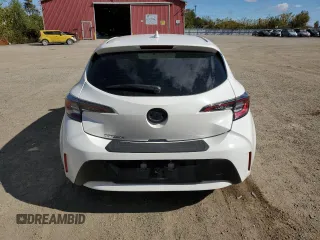 2019 Toyota Corolla Hatchback SE with VIN JTNK4RBEXK3011658, listed as a Copart auction lot 74301574 with 98,486 mi miles and Clean Title. Bid and sale history available at carsss.com. Image 6.