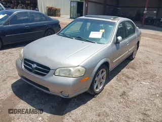 2000 Nissan Maxima GXE z VIN JN1CA31D0YT531421, wystawiony jako IAAI lot #42197398 z przebiegiem Nie podano mil oraz . Historia ofert i sprzedaży dostępna na DreamBid. Obrazek 2.