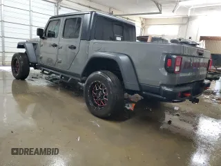 2021 Jeep Gladiator Rubicon с VIN 1C6JJTBM5ML541530, выставлен на аукционе Copart как лот 82661554 с пробегом 55 539 миль миль и Списание • Salvage title. История ставок и продаж доступна на DreamBid. Изображение 2.