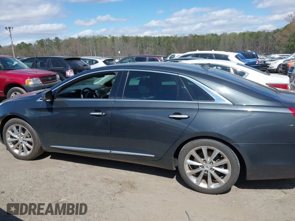 2013 Cadillac XTS Premium with VIN 2G61S5S33D9113653, listed as a IAAI auction lot 41837117 with 101,049 mi miles and . Bid and sale history available at DreamBid. Image 13.