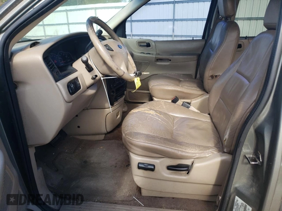 2002 Ford Windstar SE with VIN 2FMZA52462BA09199, listed as a Copart auction lot 83097064 with 216,158 mi miles and Salvage title. Bid and sale history available at DreamBid. Image 7.