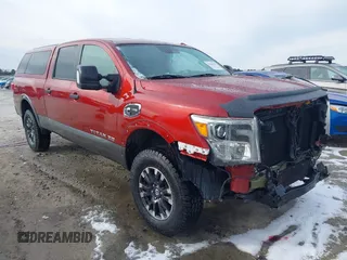2016 Nissan Titan XD PRO-4X with VIN 1N6BA1F47GN515917, listed as a IAAI auction lot 41355875 with 95,793 mi miles. Bid and sale history available at carsss.com. Image 1.