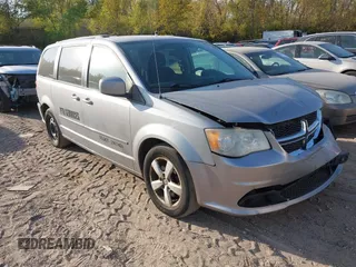 2014 Dodge Grand Caravan SXT z VIN 2C4RDGCG4ER262792, wystawiony jako IAAI lot #40460534 z przebiegiem 245 407 mil mil oraz . Historia ofert i sprzedaży dostępna na DreamBid. Obrazek 1.