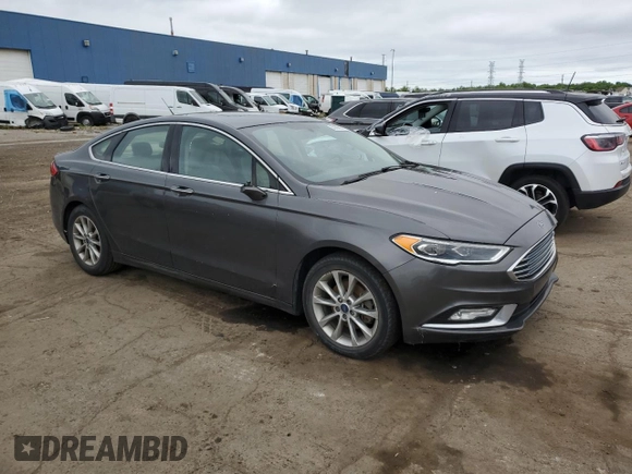 2017 Ford Fusion SE with VIN 3FA6P0HD3HR185949, listed as a Copart auction lot 58828325 with 169,148 mi miles and Clean title. Bid and sale history available at DreamBid. Image 4.