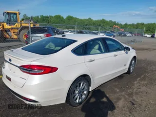 2017 Ford Fusion Titanium with VIN 3FA6P0SU6HR409854, listed as a IAAI auction lot 42143031 with 52,688 mi miles and . Bid and sale history available at DreamBid. Image 4.