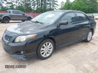 2009 Toyota Corolla with VIN 1NXBU40E19Z135389, listed as a IAAI auction lot 42188550 with 215,054 mi miles. Bid and sale history available at carsss.com. Image 2.