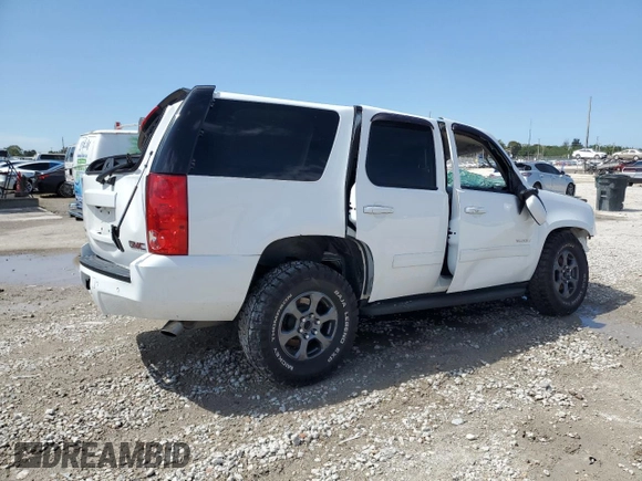 2013 GMC Yukon SLT with VIN 1GKS2CE00DR212254, listed as a Copart auction lot 49258665 with 0 mi miles and Salvage Title. Bid and sale history available at carsss.com. Image 3.