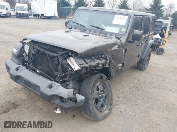2019 Jeep Wrangler Unlimited Sport Altitude with VIN 1C4HJXDG0KW559807, listed as a IAAI auction lot 41790082 with 34,221 mi miles and . Bid and sale history available at DreamBid. Image 2.