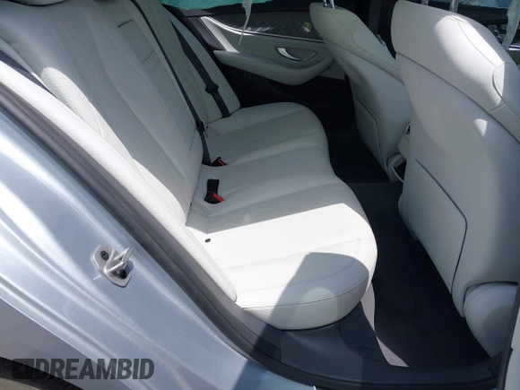 2021 Mercedes-Benz E 350 with VIN W1KZF8DB4MA977647, listed as a IAAI auction lot 42241573 with 33,666 mi miles and . Bid and sale history available at DreamBid. Image 8.