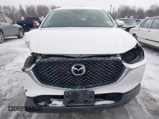 2021 Mazda CX-30 S with VIN 3MVDMBAL9MM221639, listed as a IAAI auction lot 41545920 with 57,239 mi miles and . Bid and sale history available at carsss.com. Image 6.