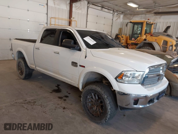 2015 Ram 1500 Laramie Limited with VIN 1C6RR7WM6FS678840, listed as a IAAI auction lot 42040449 with Not provided miles and . Bid and sale history available at DreamBid. Image 1.