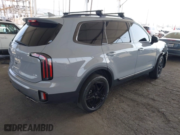 2023 Kia Telluride EX X-Line z VIN 5XYP3DGC0PG395945, wystawiony jako IAAI lot #42544923 z przebiegiem 19 046 mil mil oraz . Historia ofert i sprzedaży dostępna na DreamBid. Obrazek 4.