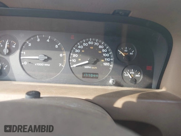 1999 Jeep Grand Cherokee Limited with VIN 1J4GW68N8XC595697, listed as a IAAI auction lot 41917466 with 177,944 mi miles. Bid and sale history available at carsss.com. Image 7.
