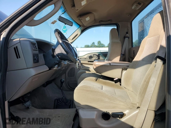 2003 Ford F-250 with VIN 3FTNF21LX3MB28837, listed as a Copart auction lot 69765954 with 97,406 mi miles and Salvage title. Bid and sale history available at DreamBid. Image 7.