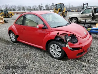 2009 Volkswagen New Beetle Coupe S with VIN 3VWPW31C79M502390, listed as a Copart auction lot 42453195 with 57,140 mi miles and Salvage Title. Bid and sale history available at carsss.com. Image 4.