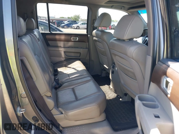 2009 Honda Pilot EX-L with VIN 5FNYF48539B035820, listed as a IAAI auction lot 41942149 with 242,463 mi miles. Bid and sale history available at carsss.com. Image 8.
