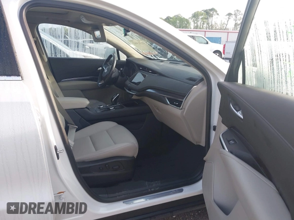 2023 Cadillac XT4 FWD Luxury with VIN 1GYAZAR48PF205055, listed as a IAAI auction lot 41915442 with 42,652 mi miles. Bid and sale history available at carsss.com. Image 5.
