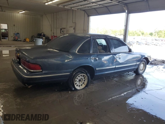 1997 Ford Crown Victoria LX с VIN 2FALP74W2VX109574, выставлен на аукционе Copart как лот 56222925 с пробегом 175 901 миль миль и Списание • Salvage title. История ставок и продаж доступна на DreamBid. Изображение 3.