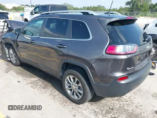 2019 Jeep Cherokee Latitude Plus with VIN 1C4PJLLB3KD143546, listed as a IAAI auction lot 42160353 with 69,296 mi miles and . Bid and sale history available at DreamBid. Image 3.