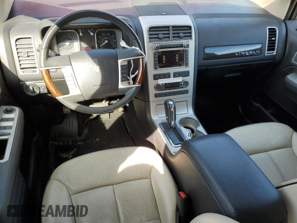 2010 Lincoln MKX with VIN 2LMDJ8JC2ABJ31128, listed as a Copart auction lot 41861205 with 56,661 mi miles and Salvage Title. Bid and sale history available at DreamBid. Image 8.