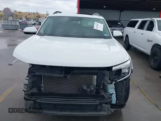 2024 Volkswagen Atlas SE z VIN 1V2JR2CA3RC508659, wystawiony jako IAAI lot #41430628 z przebiegiem 23 139 mil mil oraz . Historia ofert i sprzedaży dostępna na DreamBid. Obrazek 6.