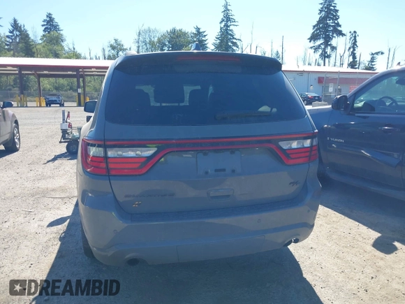 2022 Dodge Durango R/T with VIN 1C4SDJCT9NC230716, listed as a IAAI auction lot 42676407 with 21,791 mi miles and . Bid and sale history available at DreamBid. Image 16.