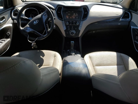 2017 Hyundai Santa Fe 2.4L z VIN 5NMZUDLB4HH032235, wystawiony jako Copart lot #49769775 z przebiegiem 102 655 mil mil oraz Szkoda całkowita • Salvage title. Historia ofert i sprzedaży dostępna na DreamBid. Obrazek 8.