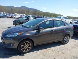 2015 Ford Fiesta SE with VIN 3FADP4BJ6FM105731, listed as a IAAI auction lot 41994903 with 150,189 mi miles. Bid and sale history available at carsss.com. Image 6.